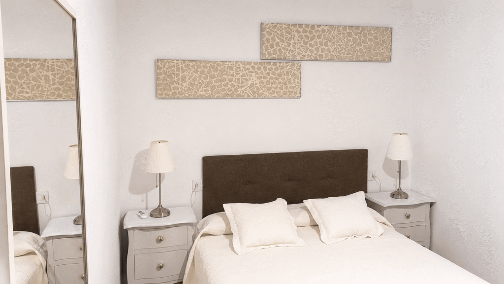 Master bedroom with bed and bedside tables